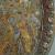 Letto funerario in bronzo da Amiterno, particolare della decorazione scultorea e  ad agemina in rame e argento