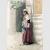 Enrico Coleman, Donna in costume laziale presso una scala, 1870-1890, grafite e acquerello